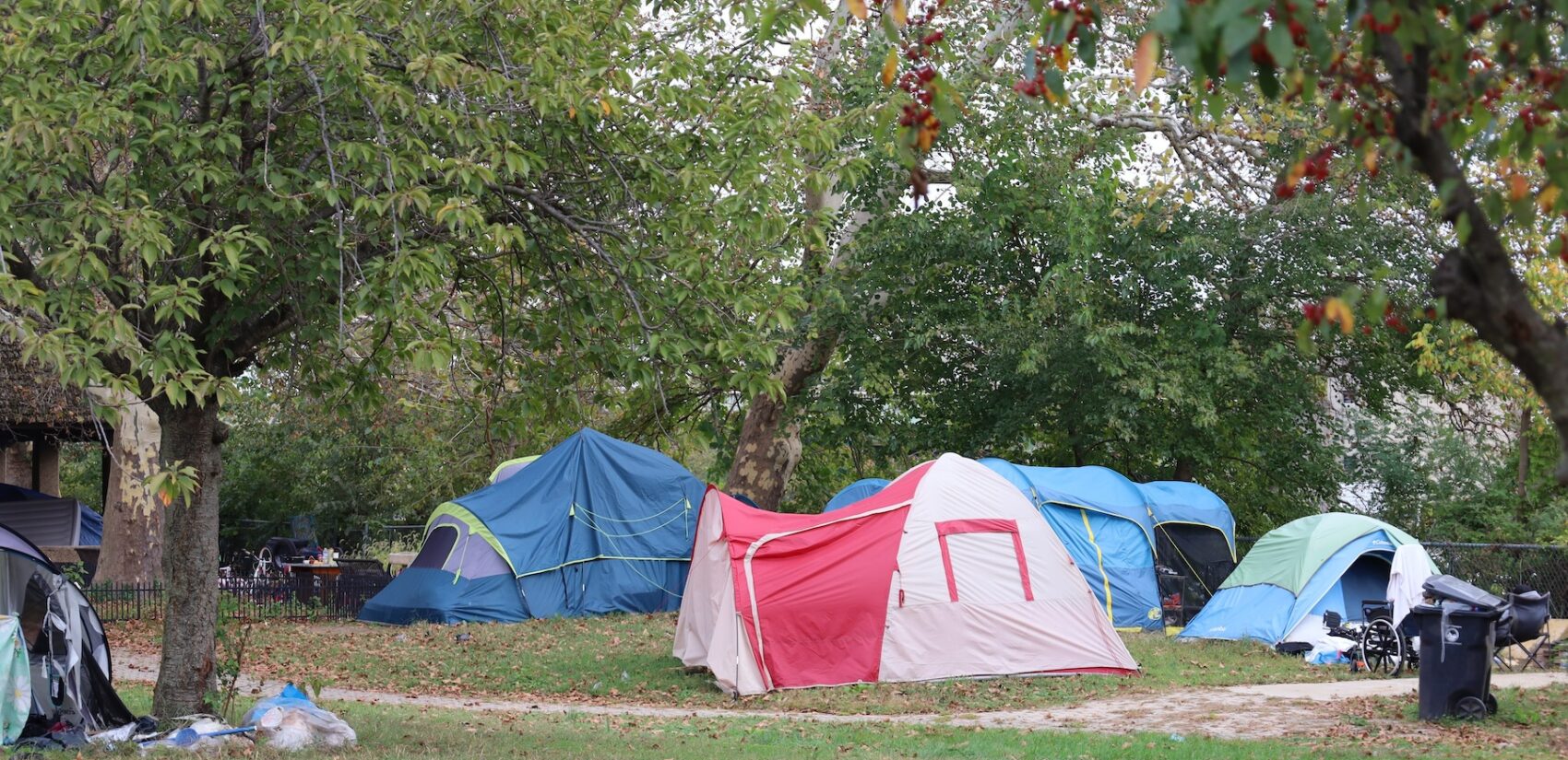 Tents cover the grounds of Christina Park