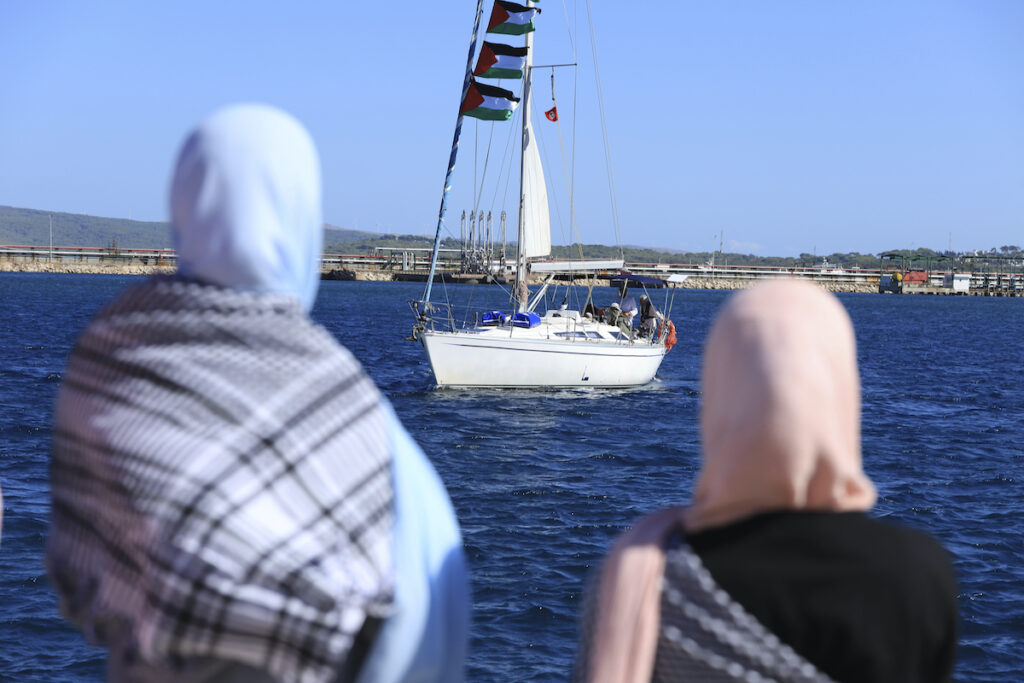 Tunisia Gaza Flotilla Supporters watching boat departs to Gaza