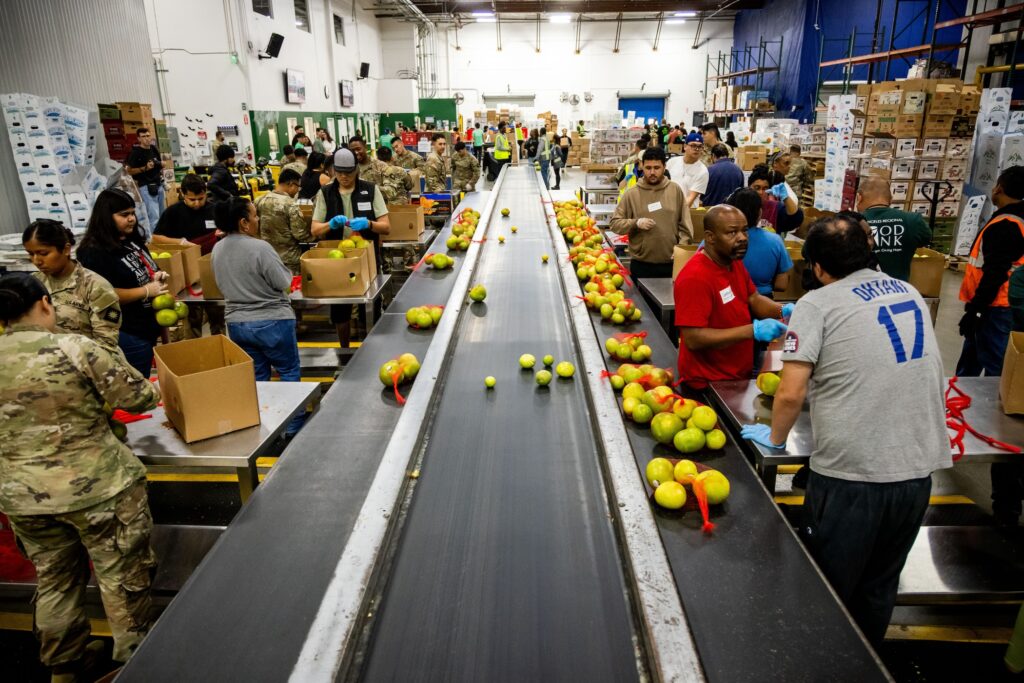 Government Shutdown Volunteers sorting food at a food bank