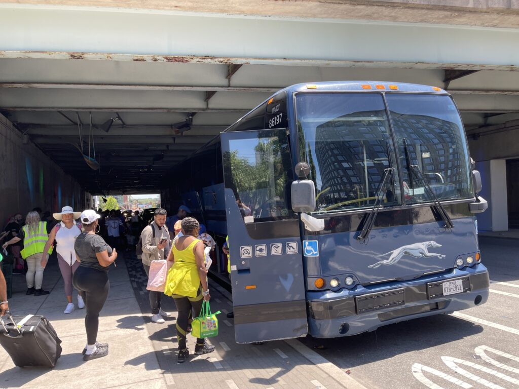 Passengers got on a Greyhound bus on Spring Garden Street