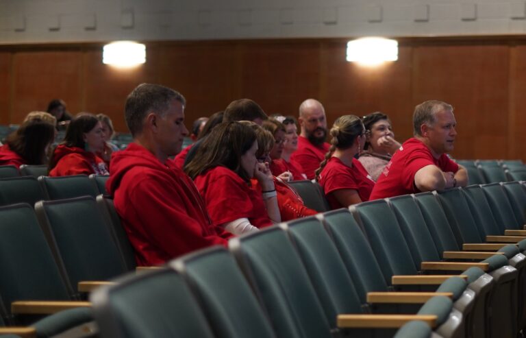Teachers, wearing red, are seen at the Haverford school board meeting on Oct. 9, 2025