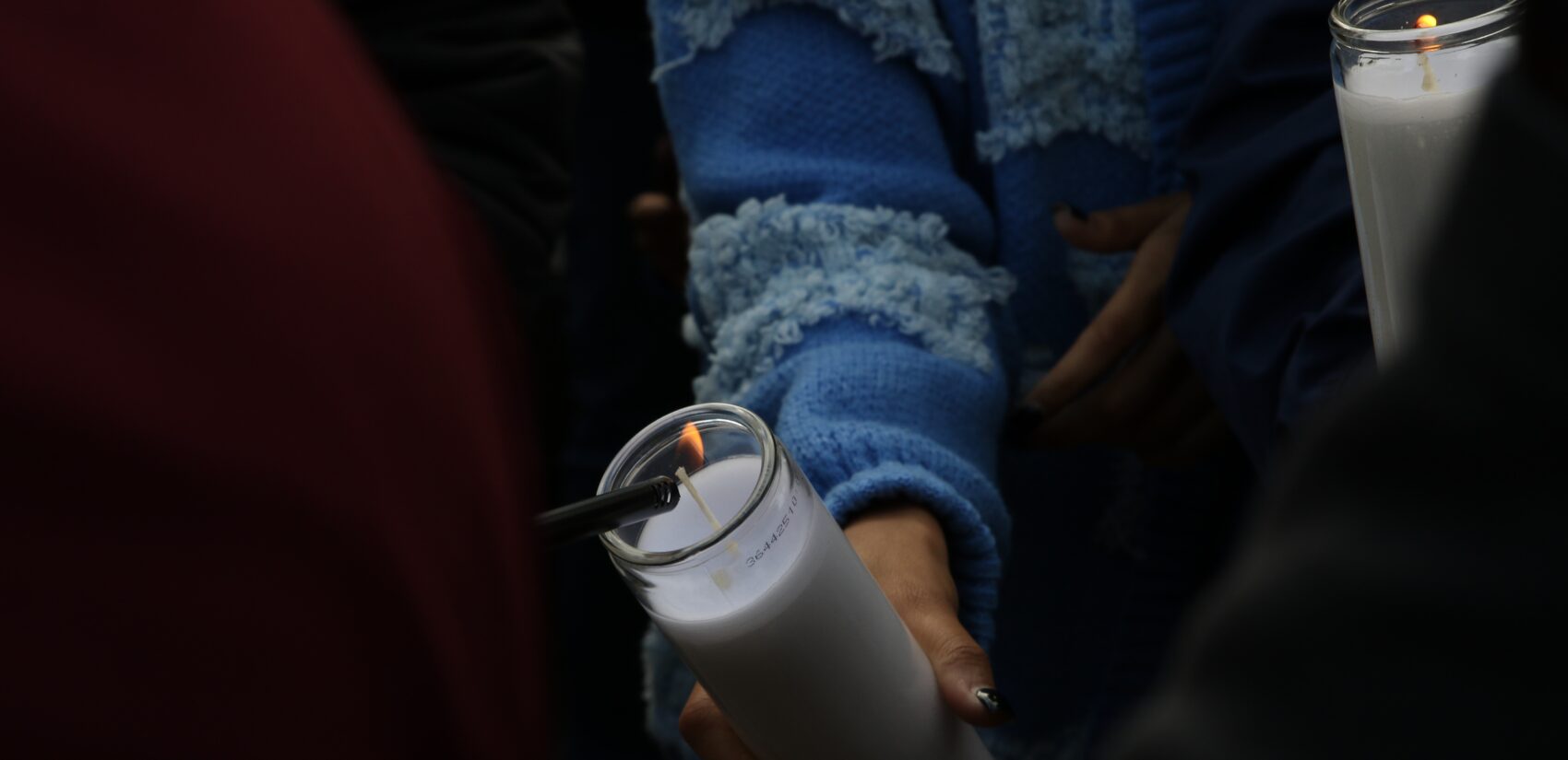 lit candles at the Kada Scott vigil