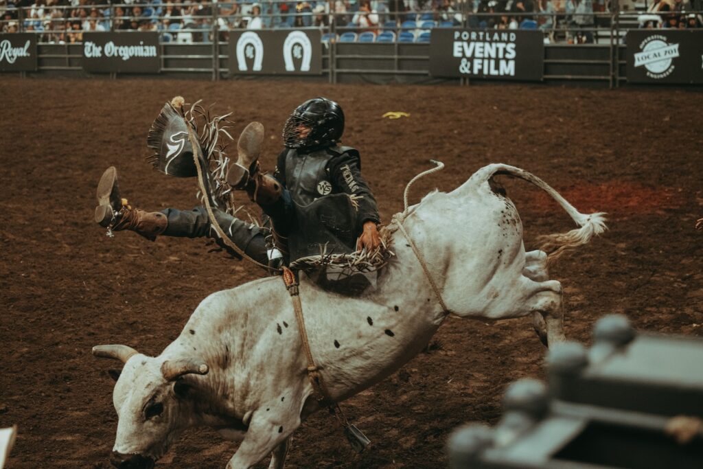 Kamal Miller rides a bull