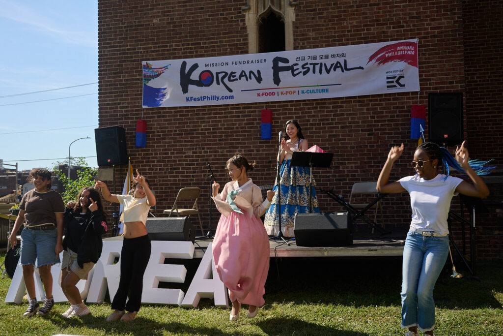 korean-festival-bp-100525 Adah Cho (pictured rear), acting at the event’s emcee