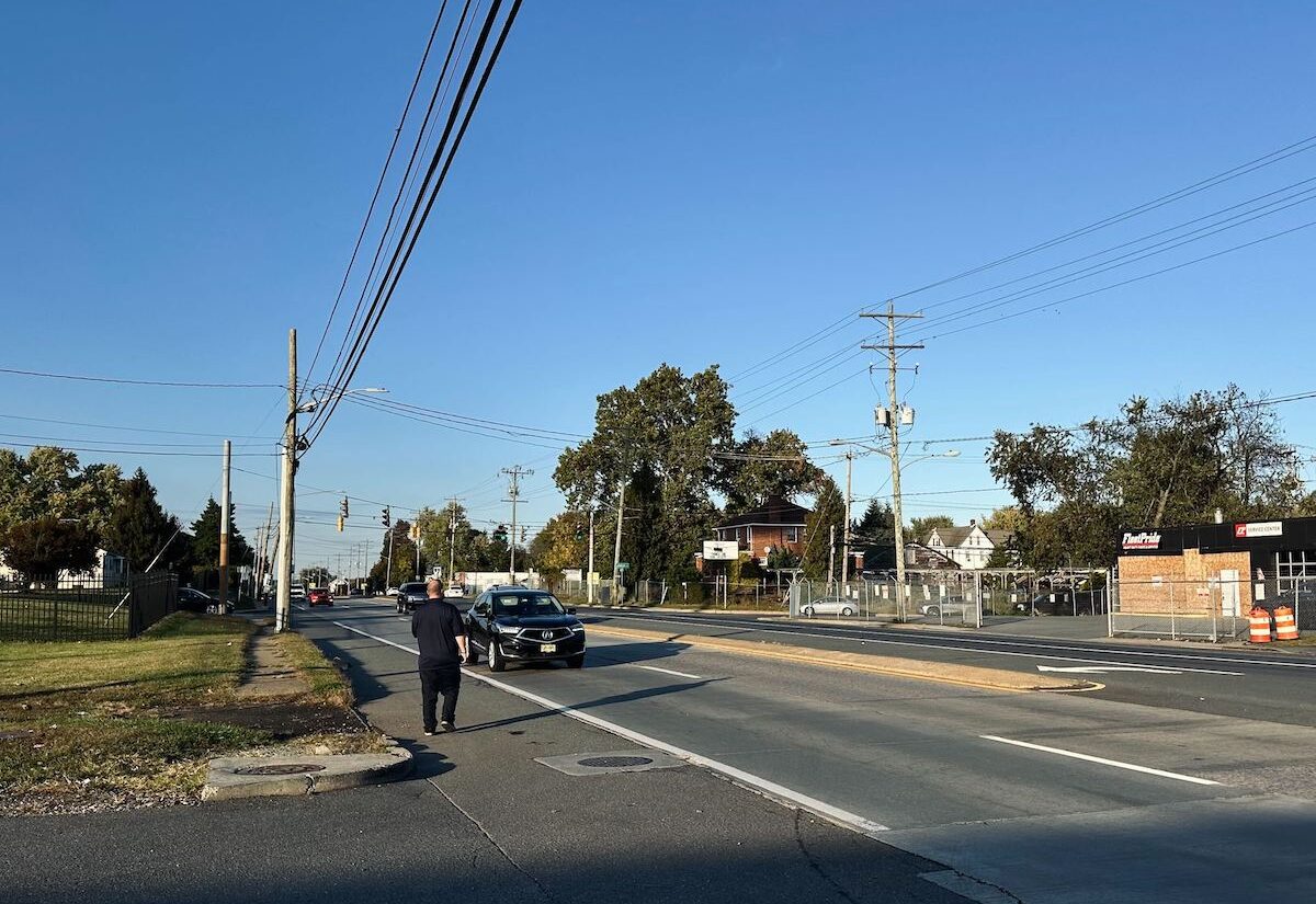 Man attempting to walk across Route 9 highway