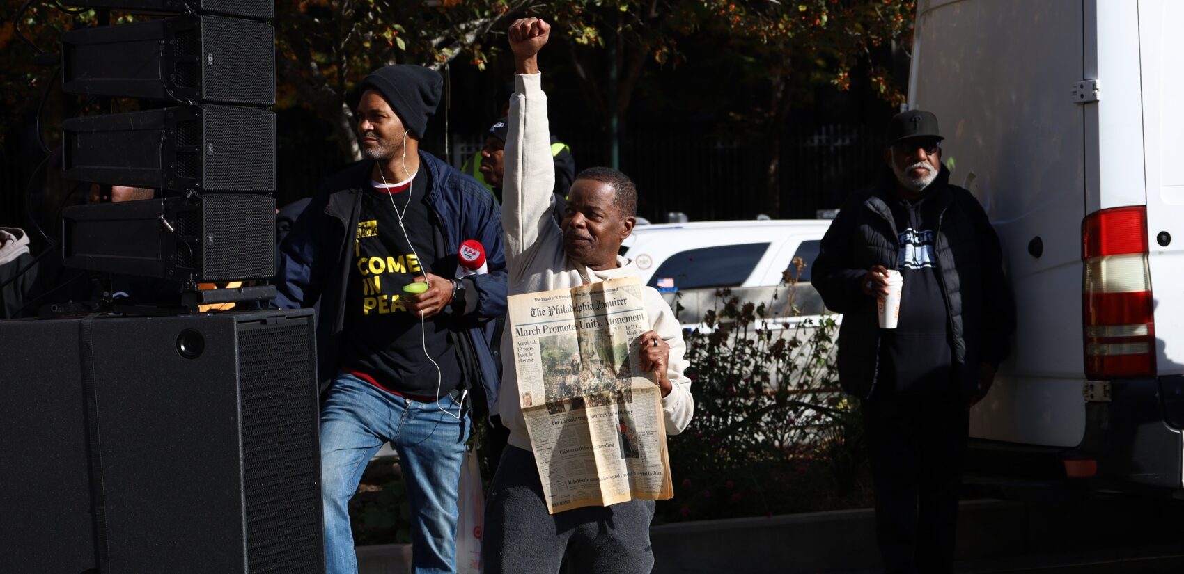 An attendee held up his copy of the Philadelphia Inquirer from 1995 with a front page story on the Million Man March