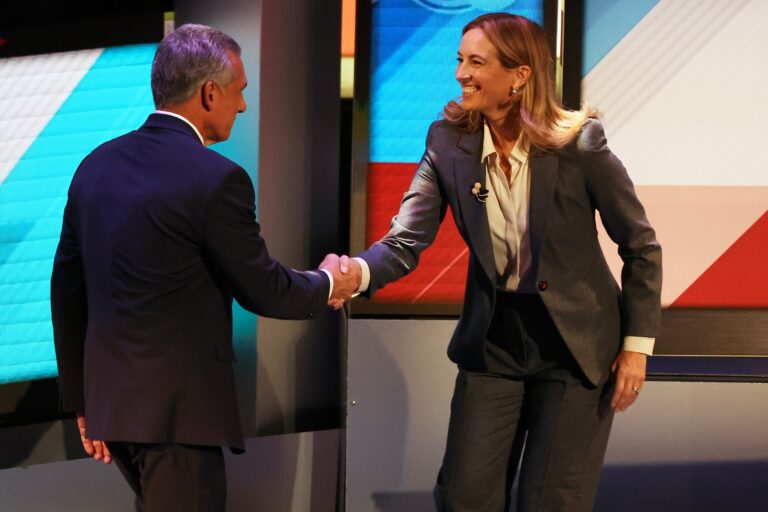 Republican Jack Ciattarelli (left) and Democrat Mikie Sherrill shake hands at the end of the final debate in the New Jersey governor's race, Wednesday, Oct. 8, 2025, in New Brunswick, N.J.