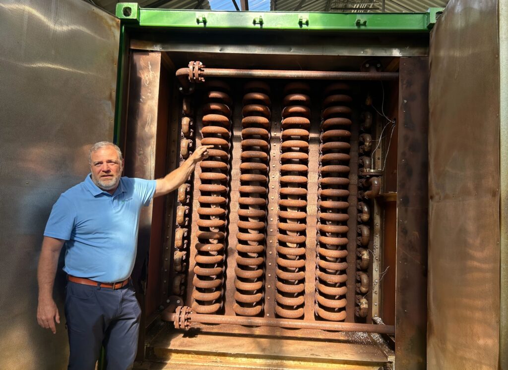 Dan Spracklin posing for a photo in the plant