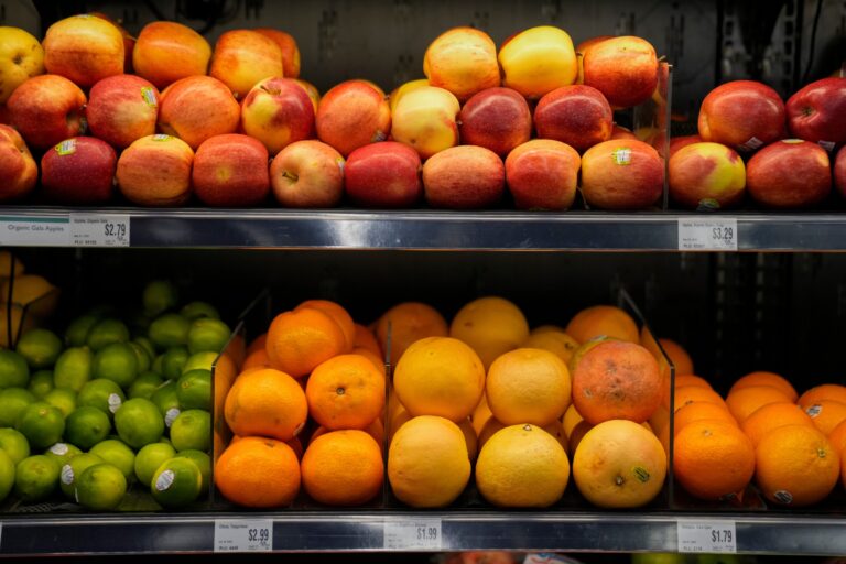 Fruits on shelves in the supermarket