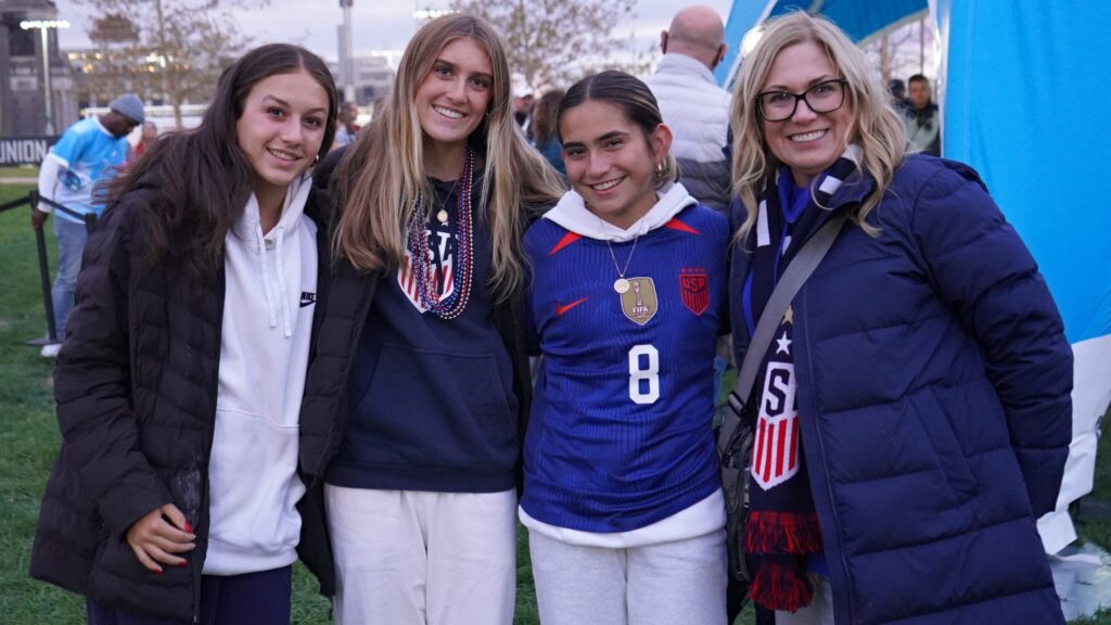 uswnt-chester-game-bp Four women posing for a photo