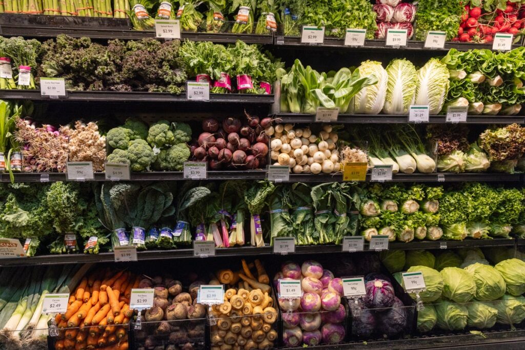 05-15-2024-k-paynter-reduced-weavers-way-coop-germantown-7 A stocked produce aisle at a supermarket