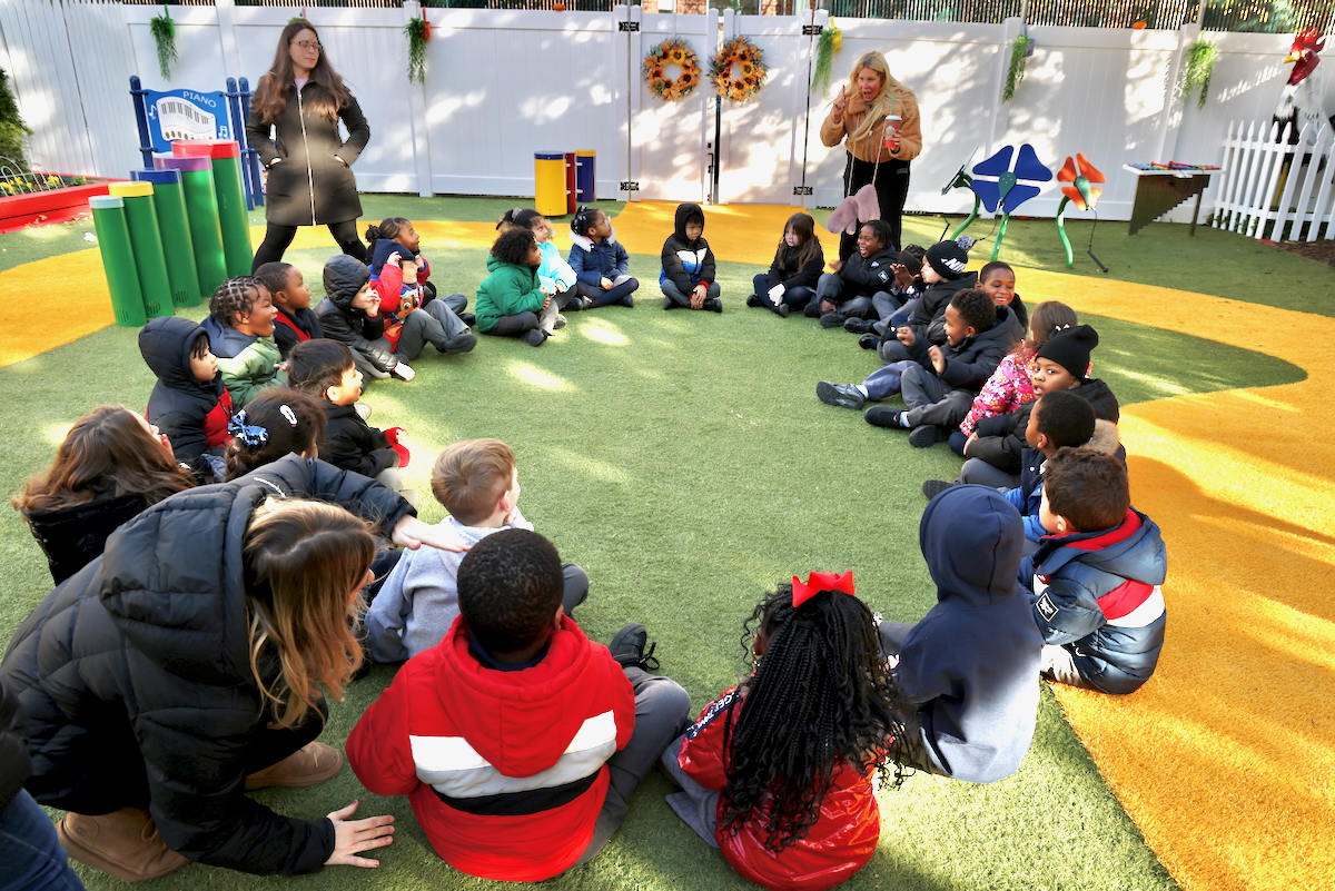 children playing duck duck goose