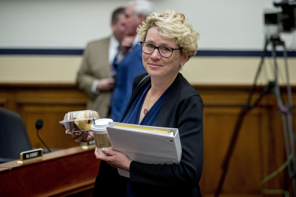 Chrissy Houlahan Chrissy Houlahan holds papers
