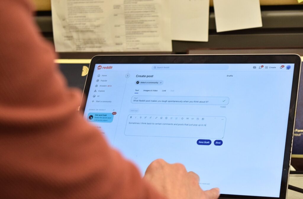 Users on social platforms like Reddit are being accused of using AI to write posts. (Nichole Currie/WHYY)