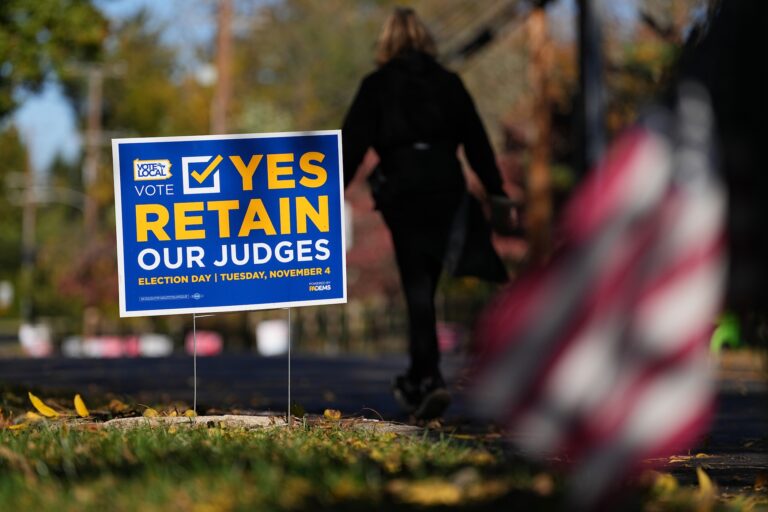 An election sign on a lawn
