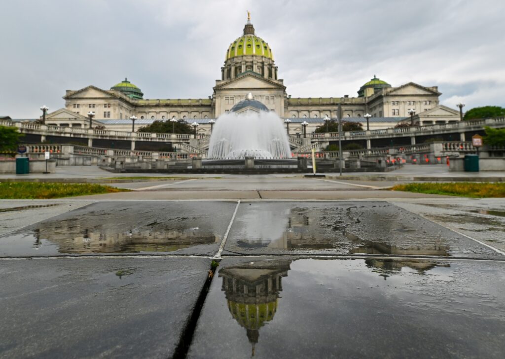 Pennsylvania Budget The Pennsylvania State Capitol is reflected on the ground