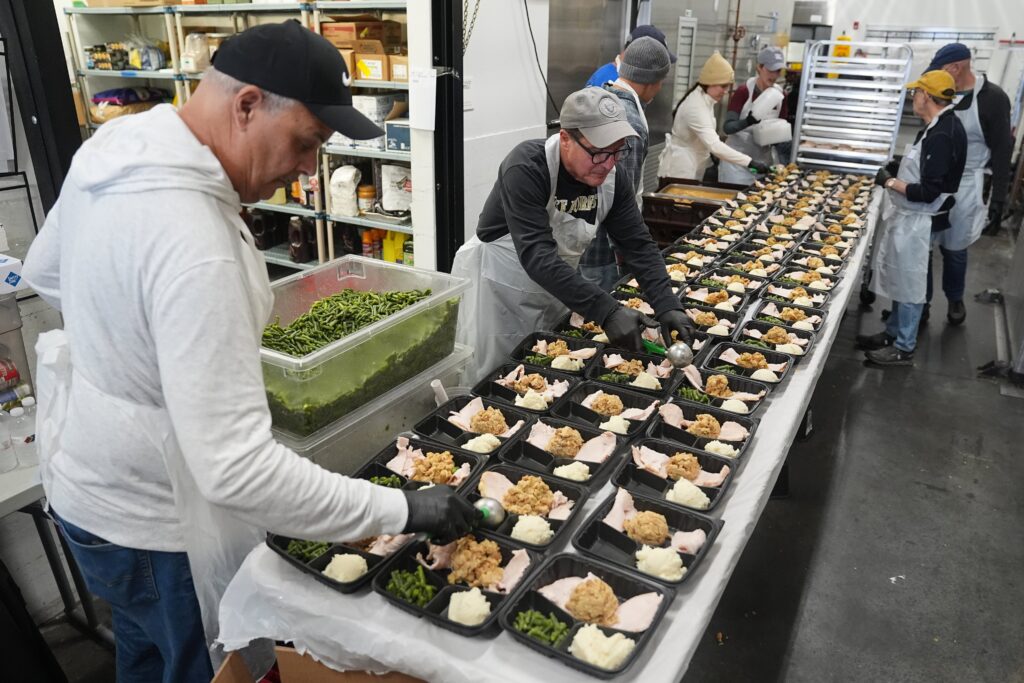 philabundance-community-kitchen-philadelphia-2025-10-30 Volunteers prepare meals at Philabundance Community Kitchen