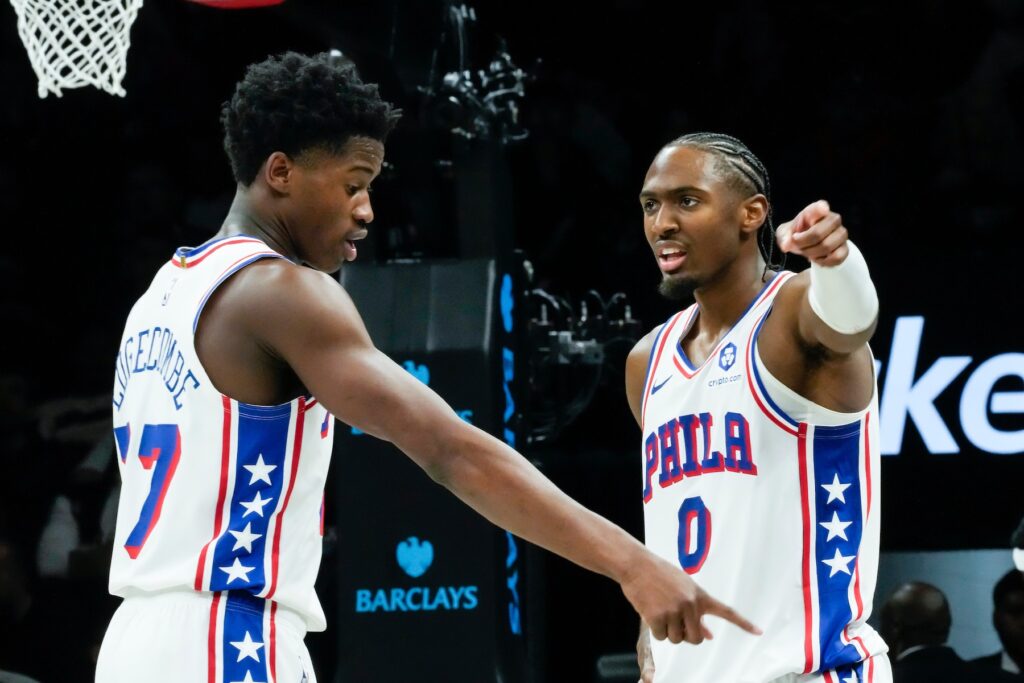 76ers Nets Basketball Philadelphia 76ers' VJ Edgecombe, left, talks to Tyrese Maxey (0)