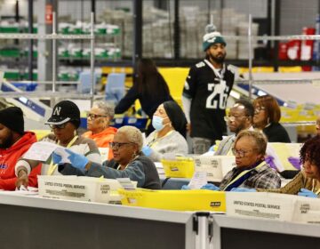 Election workers prepare ballots for scanning at the City of Philadelphia Election Warehouse in North Philadelphia.