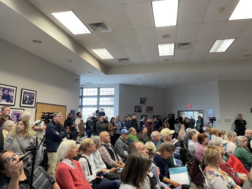 People at the school district meeting