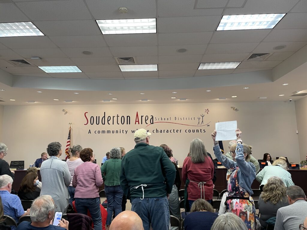 People at the school district meeting