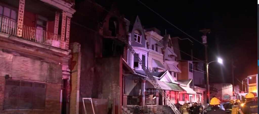 strawberry-mansion-philadelphia-fire Firefighters and emergency personnel are gathered outside of a home in Philadelphia