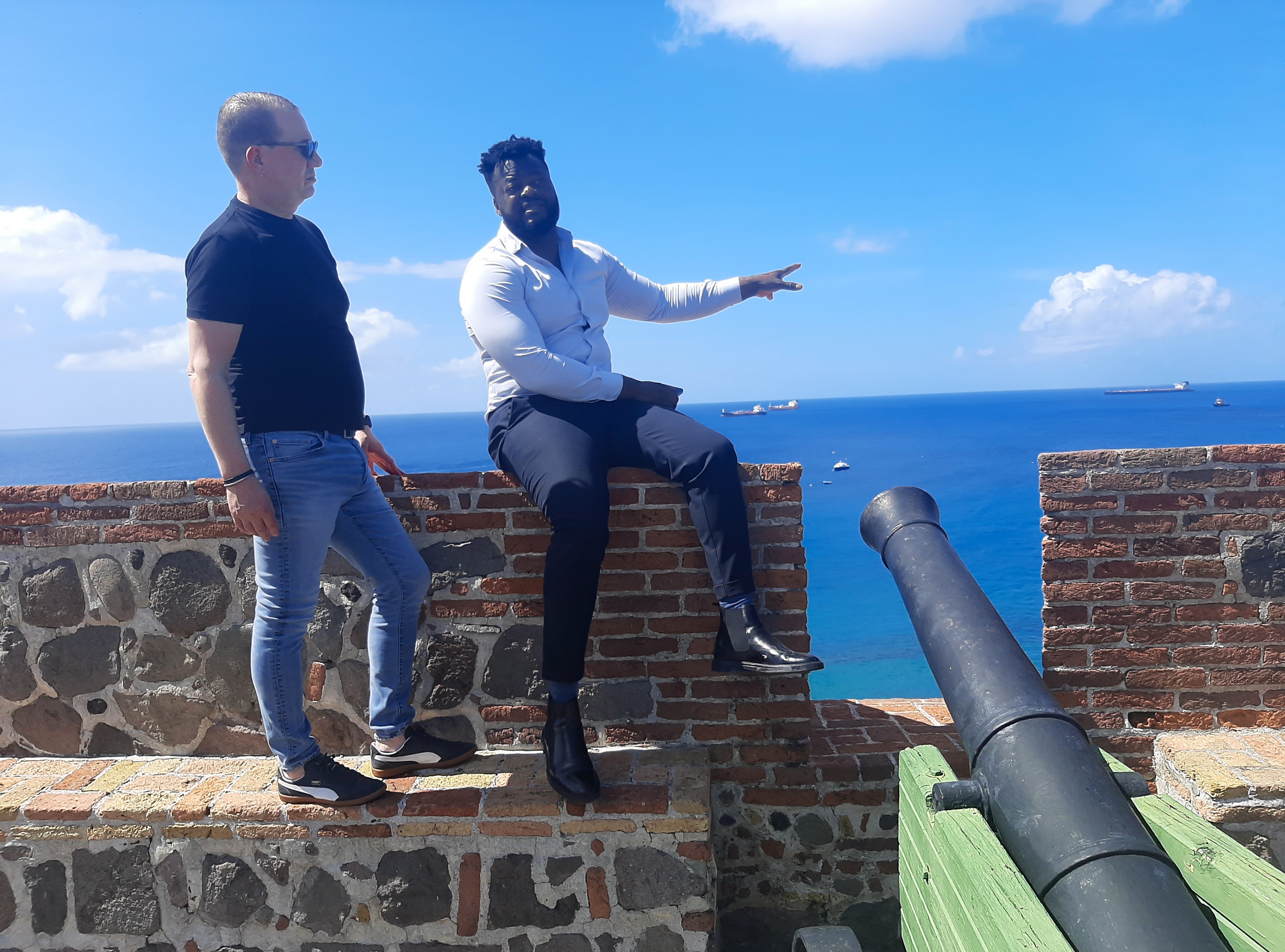 Weitzman Musuem curator Josh Perelman on St. Eustatis island talks with Raimie Richardson, a Sint Eustatius heritage inspector
