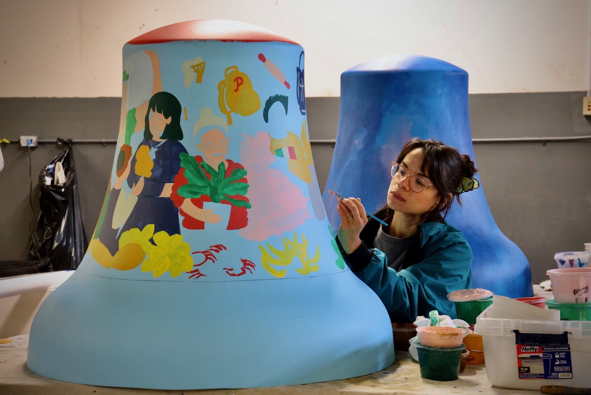 Cindy Lozito painting her bell