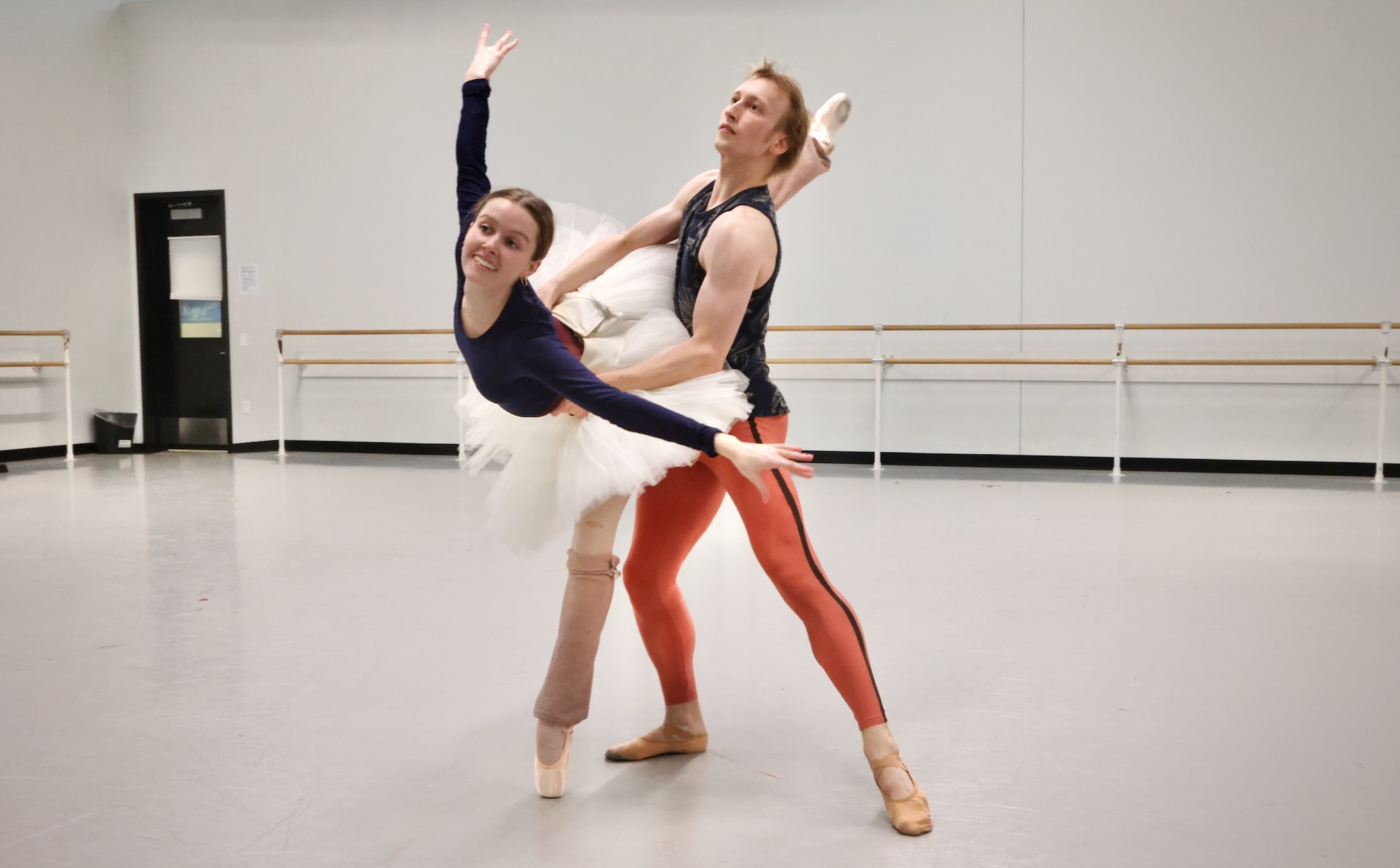 Two ballet dancers rehearsing in the dance studio
