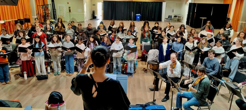 2025 12 15-p crimmins-laura harmon-philadelphia-pennsylvania youth choir ensembles three cosmic friends conductor Conductor Laura Harmon leads singers with the Philadelphia Youth Choral Ensembles