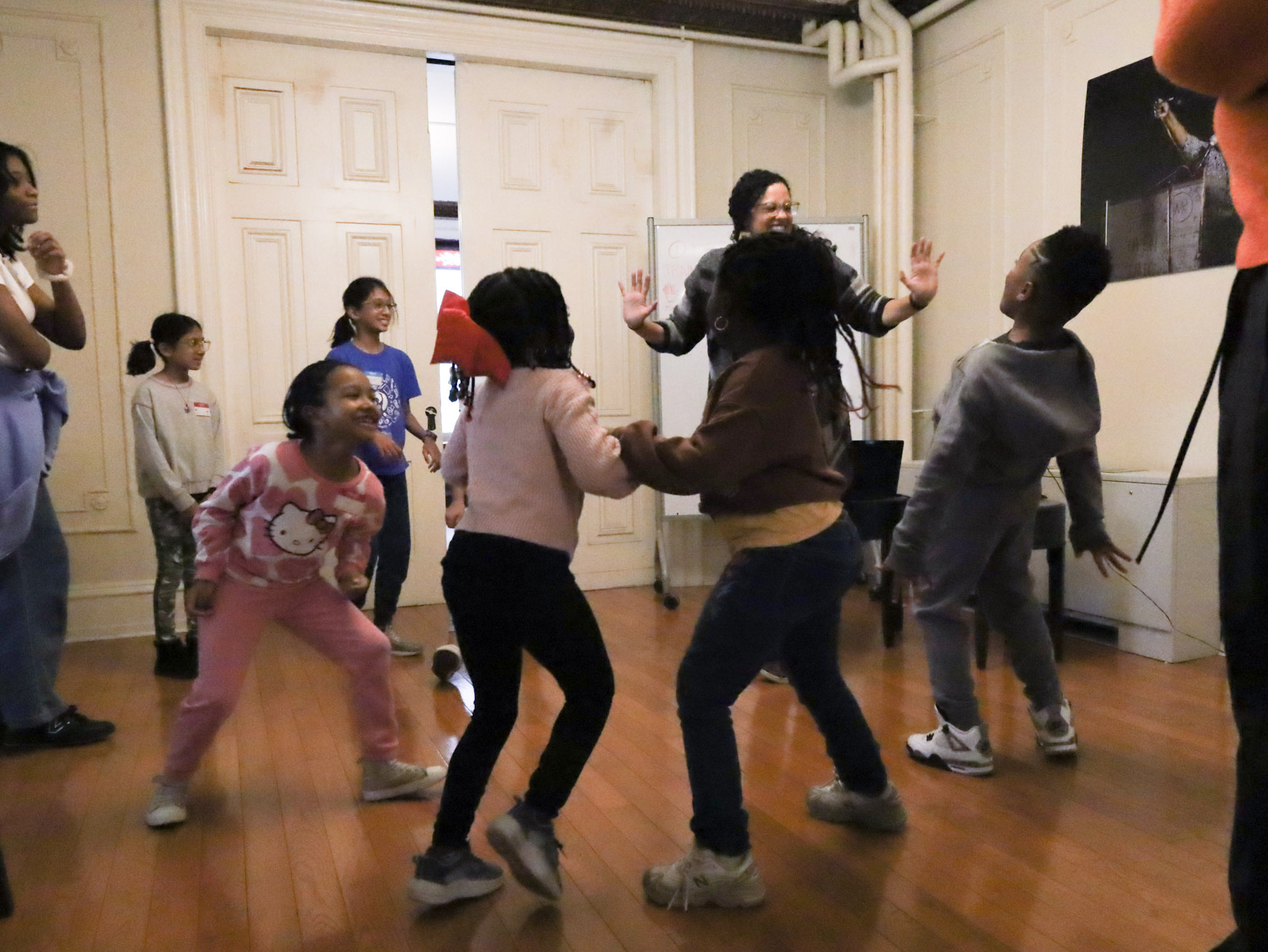 Kids in a group dancing
