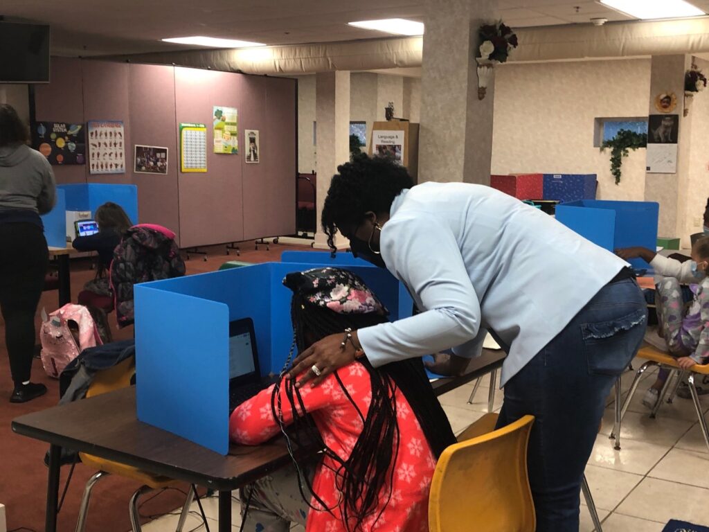 a-leap-of-faith-file-cb A Leap of Faith child care owner Melanie Thomas-Price works with fifth-grader Cameryn Jones