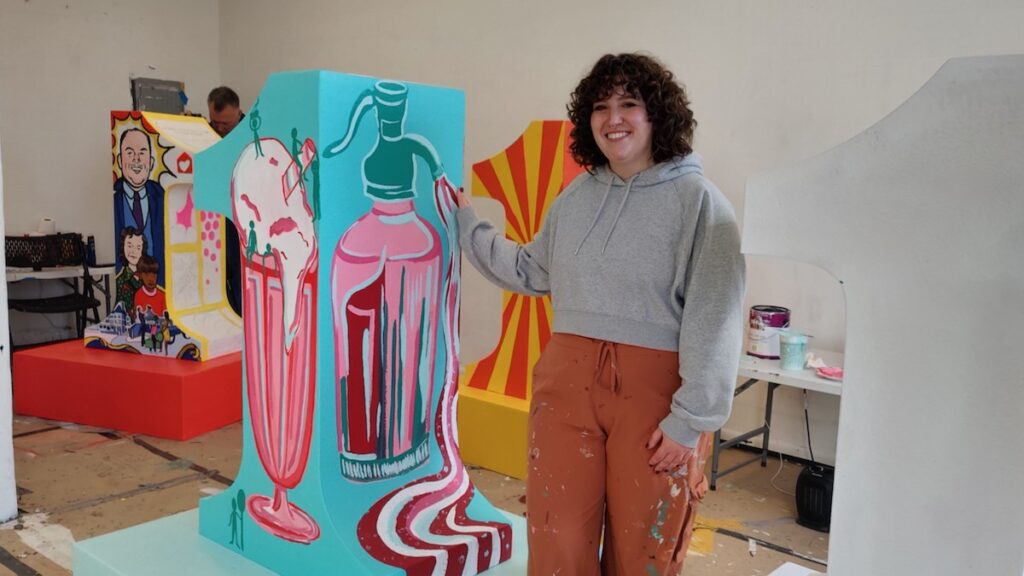 artists-chop-52-firsts-project-PC-120325-02 Roselyn Dooley stands next to her sculpture