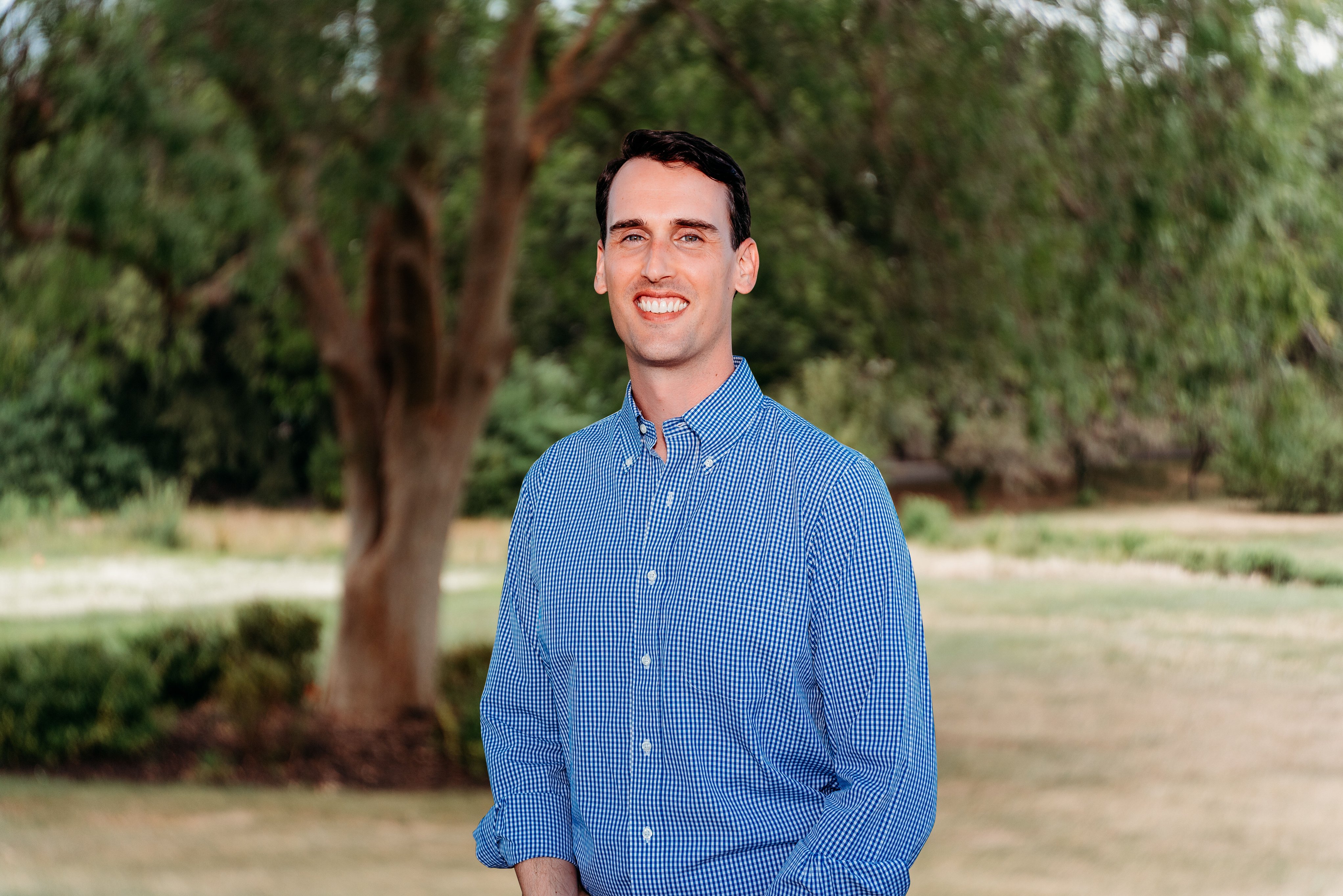 John Reynolds smiles