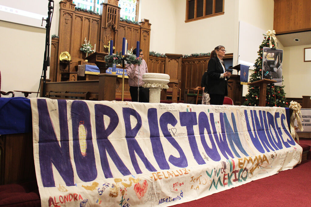 montco-welcoming-policies-1 Members of Montco Community Watch and Pennsylvania Immigration Coalition standing on stage