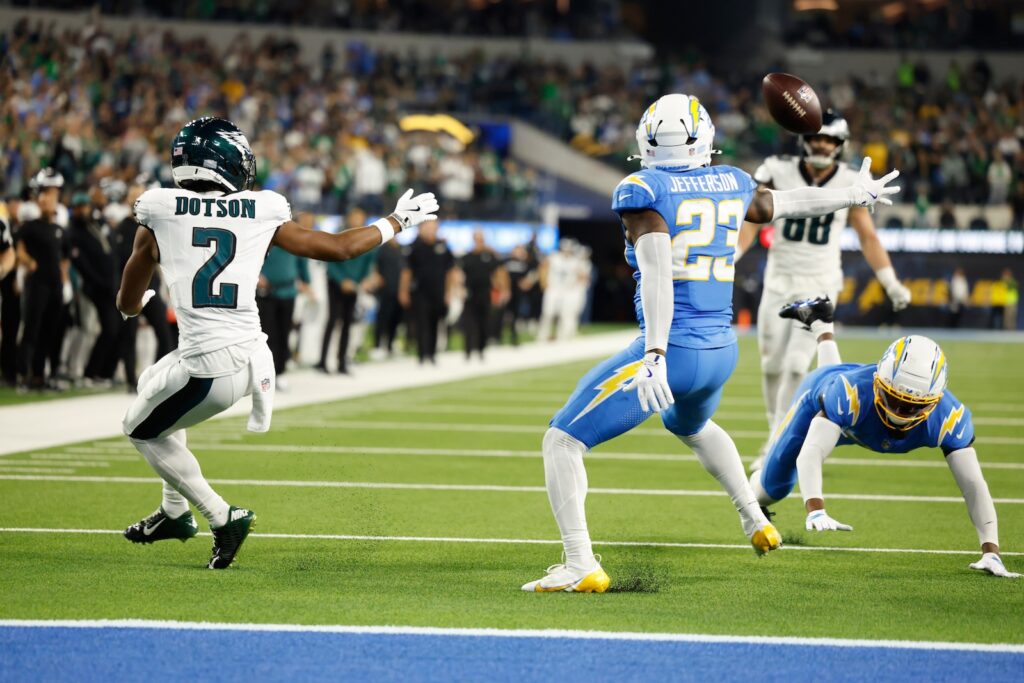 Los Angeles Chargers safety Tony Jefferson (23) intercepts a pass intended for Philadelphia Eagles wide receiver Jahan Dotson (2) during overtime of an NFL football game Monday, Dec. 8, 2025, in Inglewood, Calif