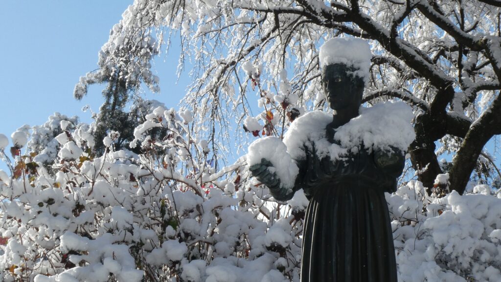 a statue covered in snow