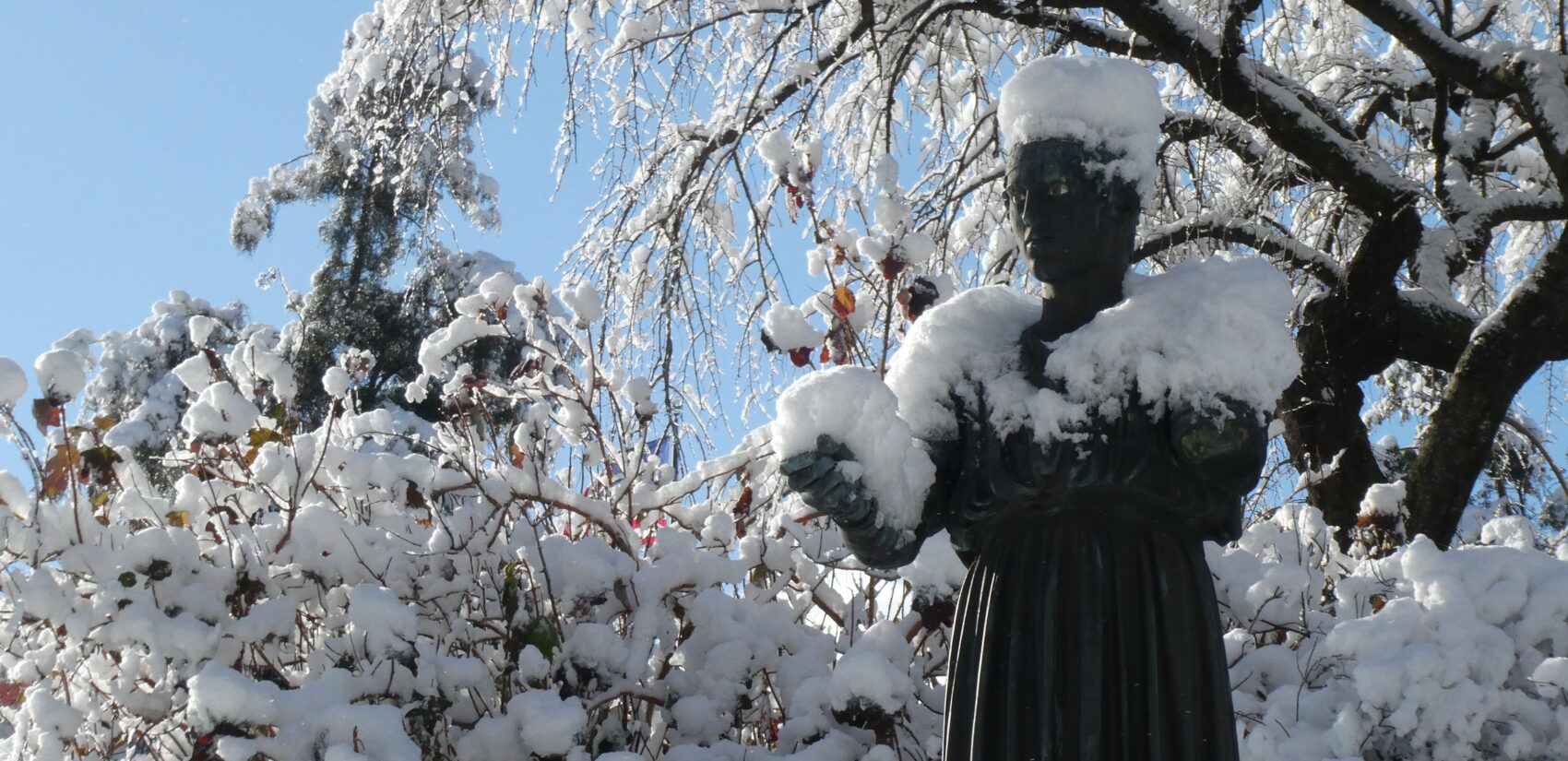 a statue covered in snow