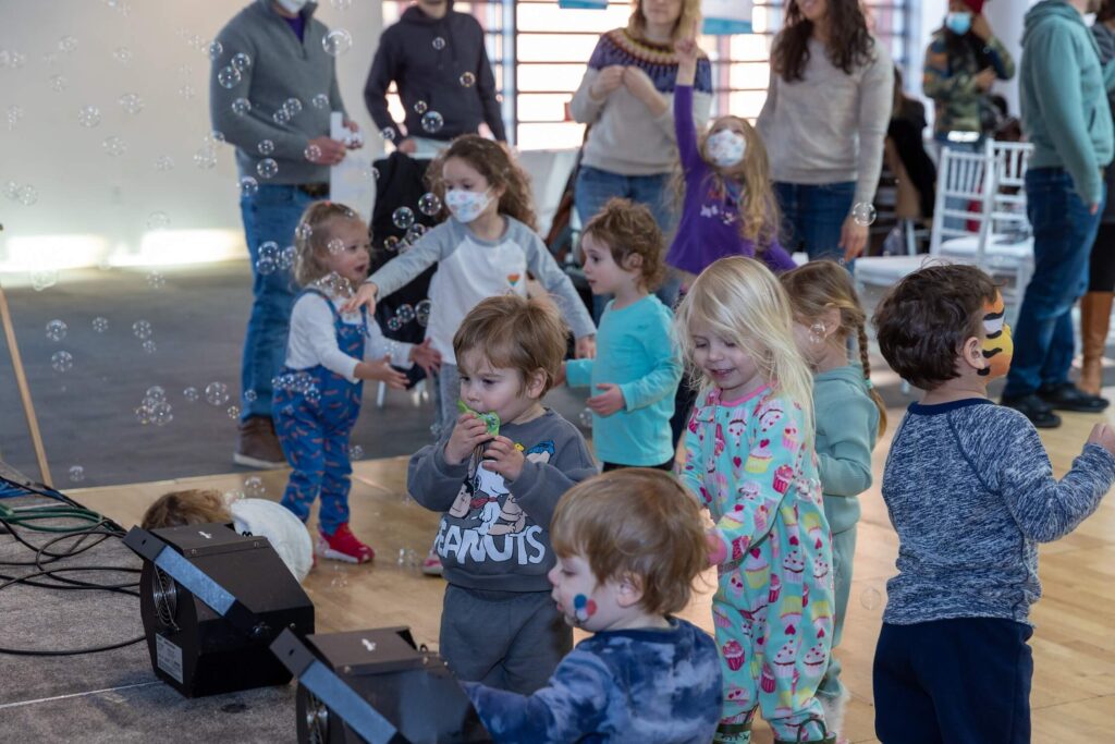 Kids play with bubbles at The Weitzman