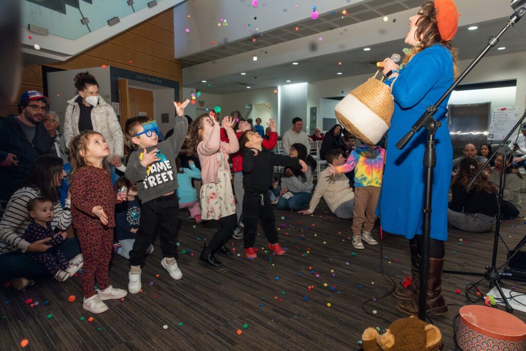 weitzman-christmas-party-122525-03 Kids dance to musical performances at The Weitzman