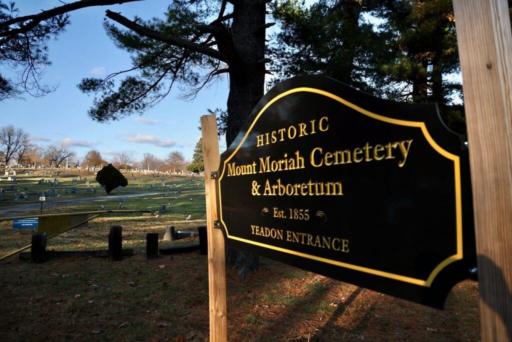 2024-11-25-e-lee-yeadon-pa-mount-moriah-cemetery-arch-street-reburial A sign welcomes people to the Mount Moriah Cemetery