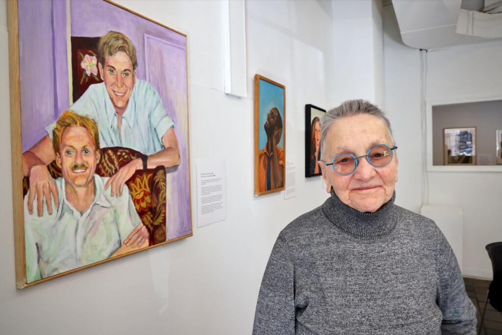 2026 01 15-e lee-arleen olshan-philadelphia germantown imperfect gallery-william way 50th art exhibit arleen olshan portraits Arleen Olshan next to paintings