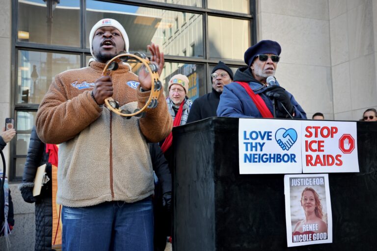 Pennsylvania state Sen. Art Haywood (right) and Moses Possible lead hundreds of protesters in singing civil rights songs during a Martin Luther King Jr. Day protest against raids by ICE agents.