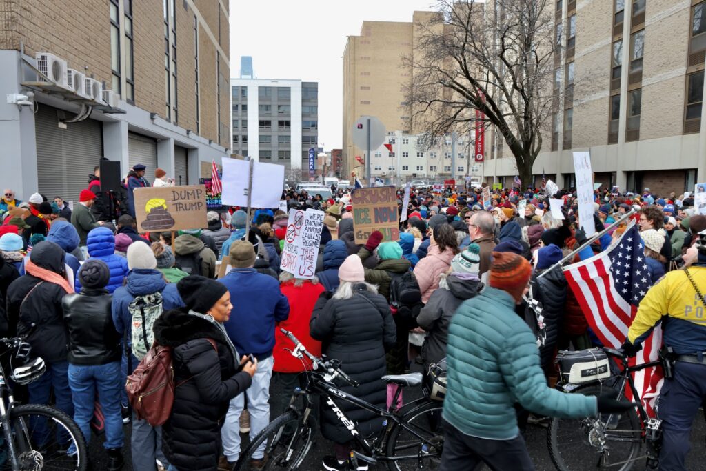 Hundreds of protesters gather outside the Philadelphia Immigration Court at 9th and Market streets to call for an end to raids by ICE agents.