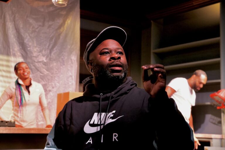 Akeem Davis speaking at Good Bones rehearsal