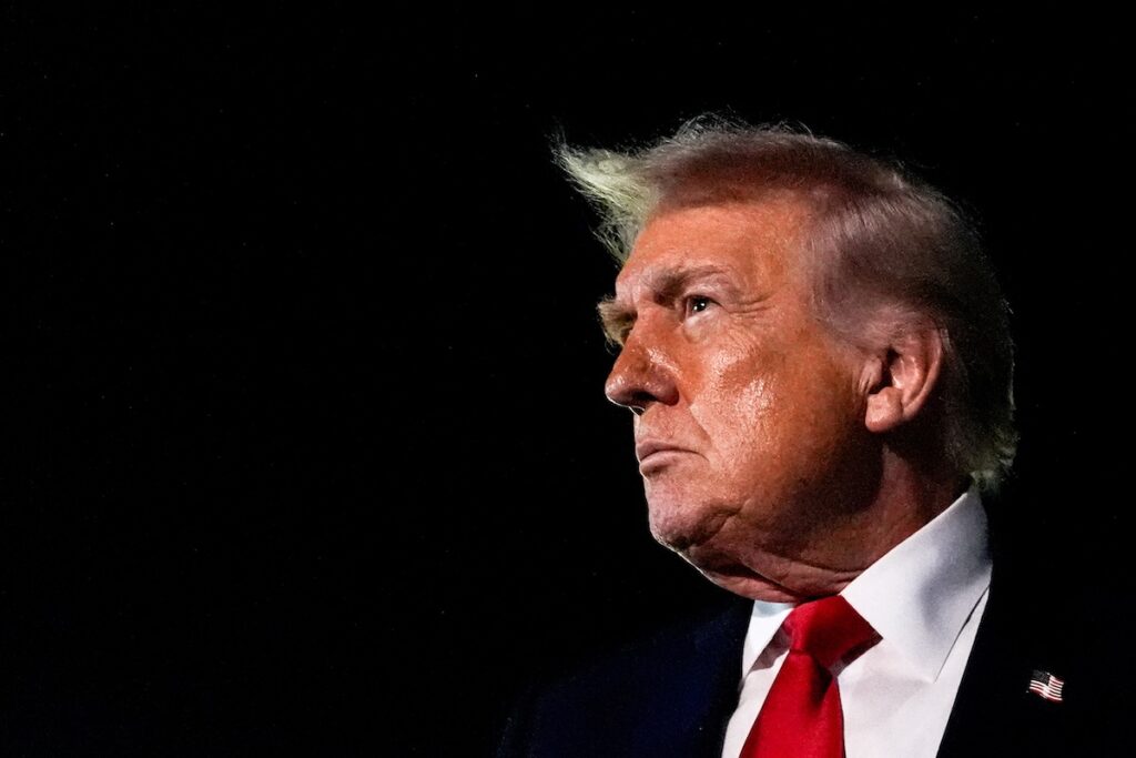 Trump President Donald Trump speaks with reporters after arriving at Palm Beach International Airport