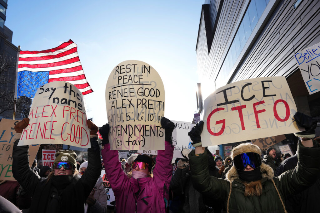 Immigration Enforcement Minnesota People protest against ICE (Immigration and Customs Enforcement) in downtown Minneapolis, Sunday, Jan. 25, 2026. (AP Photo/Adam Gray)