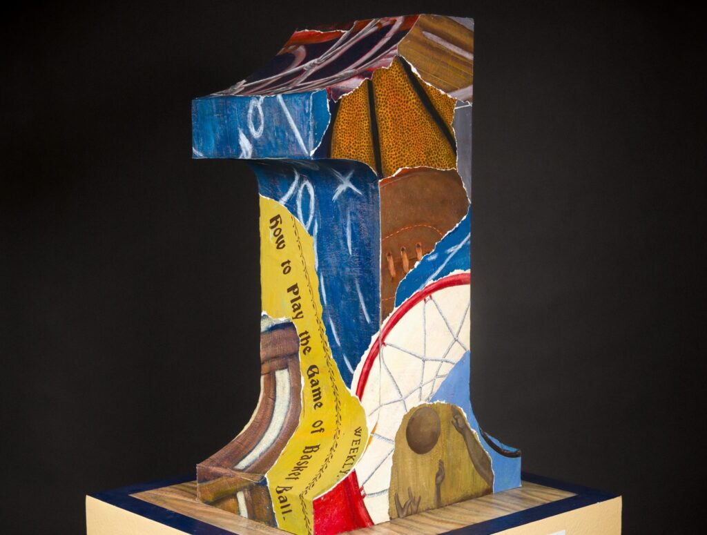 A hand carved artistic numeral 1 sculpture