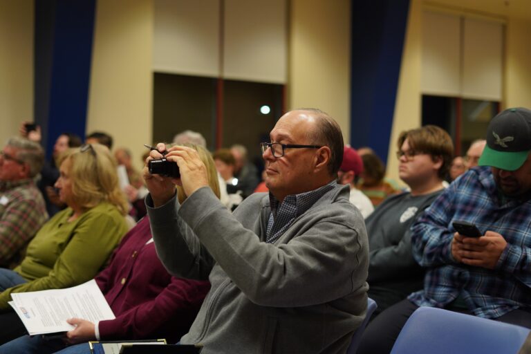 Audience members listen as Democratic hopefuls Tracy Hunt, Lucia Simonelli and Rob Strickler hold a town hall in Horsham