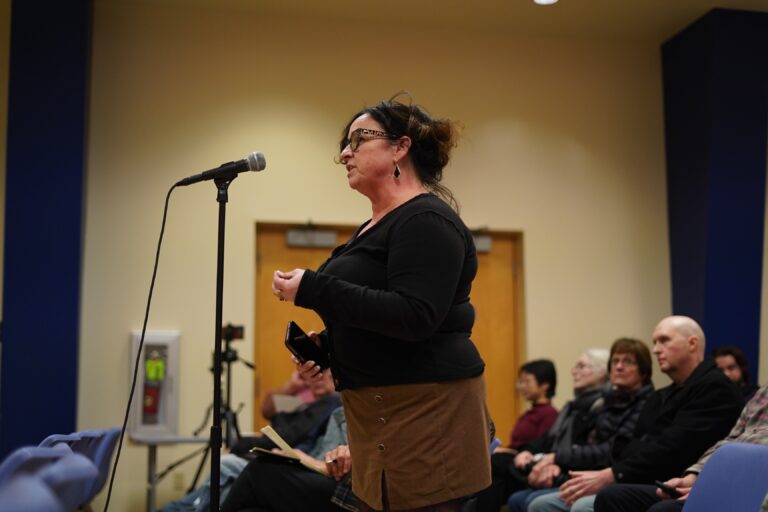 An audience member speaks as Democratic hopefuls Tracy Hunt, Lucia Simonelli and Rob Strickler hold a town hall in Horsham